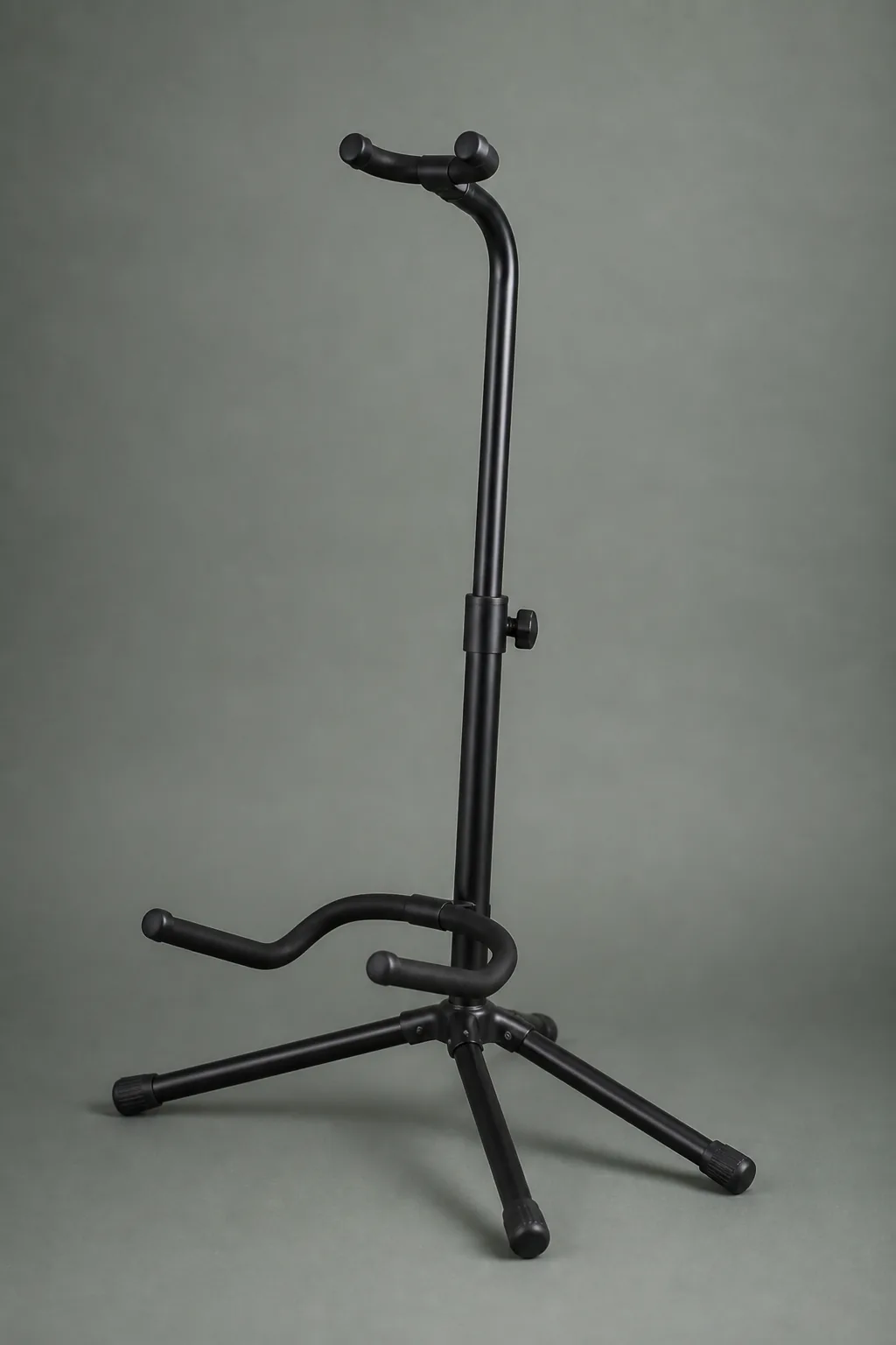 Black metal tripod guitar stand